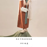 Song Dynasty Hanfu retro three-piece women's outfit with skirt and stylish handbag, showcasing traditional elegance.