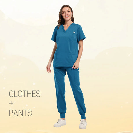 Model wearing multicolor pet clinic scrub set with short sleeve top and pants in a hospital setting.