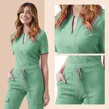 Women’s green medical scrub set featuring a pocket top and pants, designed for comfort and style in healthcare settings.
