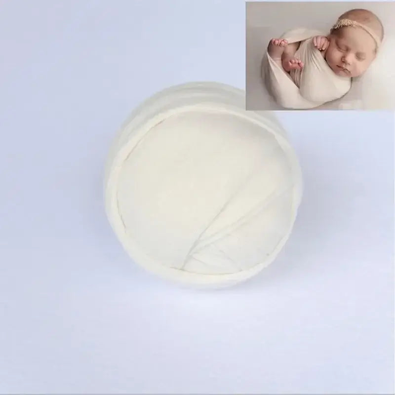 Solid white blanket photo shoot backdrop, ideal for newborn photography, made of soft polyester material.