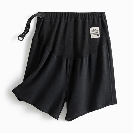 Black plus size adjustable maternity shorts, loose fit, perfect for summer, made of comfortable polyester.
