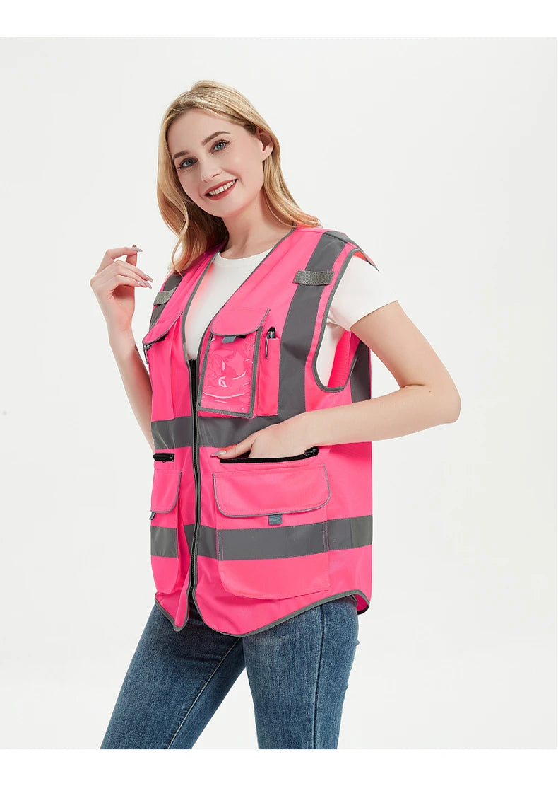 High visibility pink safety vest for women featuring multiple pockets and reflective tape, ideal for work uniform.