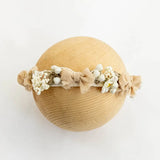 Adjustable faux flower headband for newborn girls, perfect for baby head flower photography sessions.