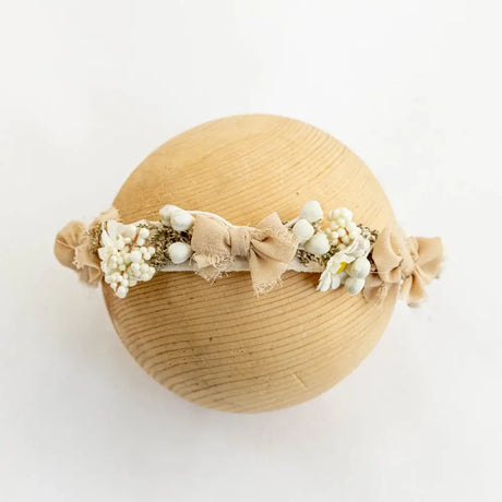 Adjustable faux flower headband for newborn girls, perfect for baby head flower photography sessions.