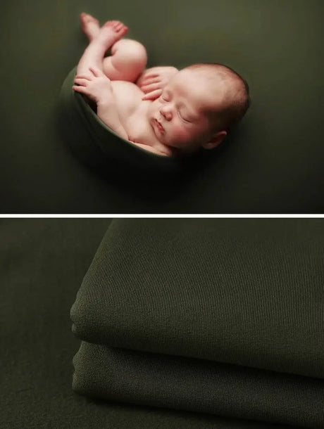 Newborn soft wrap blanket in dark green, perfect for photography, cuddling, and keeping babies cozy.