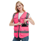 High visibility pink safety vest for women with reflective tape and multiple pockets, ideal for work and outdoor activities.