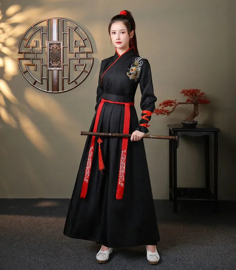 Elegant woman in black Streetwear Casual Chinese Hanfu Dress, showcasing intricate details with red accents.