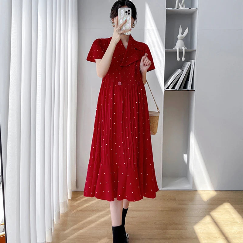 Polka dot Korean maternity dress in red with V-neck and short sleeves, perfect for summer fashion.