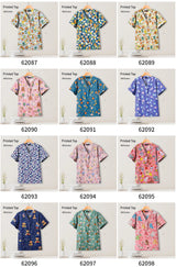Collection of colorful printed tops for pediatric nursing uniforms, featuring fun designs and V-necks in various patterns.