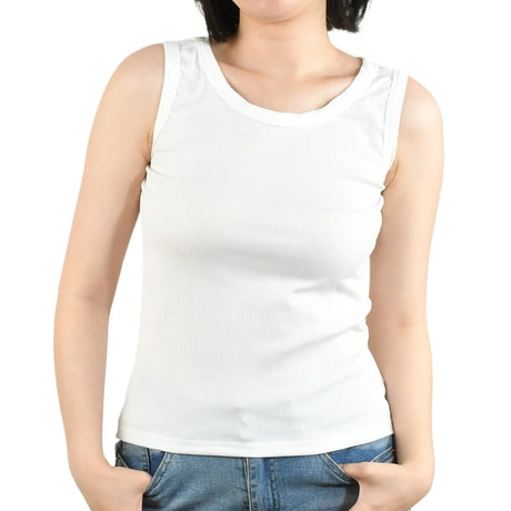 Woman wearing a white SlipFit™ anti-slip invisible cami, perfect for summer comfort and lightweight style.