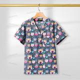 Printed nursing scrub top featuring colorful owl design, short sleeve, breathable cotton fabric, ideal for healthcare professionals.