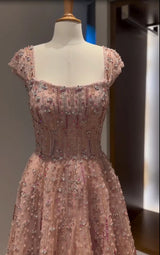 Fully crystal mermaid wedding gown with beaded details and square neckline in soft pink, perfect for brides.