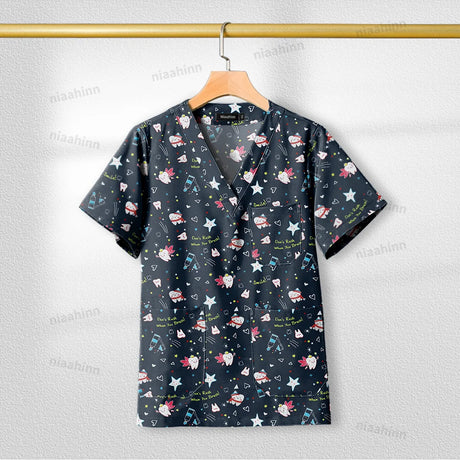 Printed nursing scrub top with short sleeves and playful patterns, perfect for healthcare professionals.