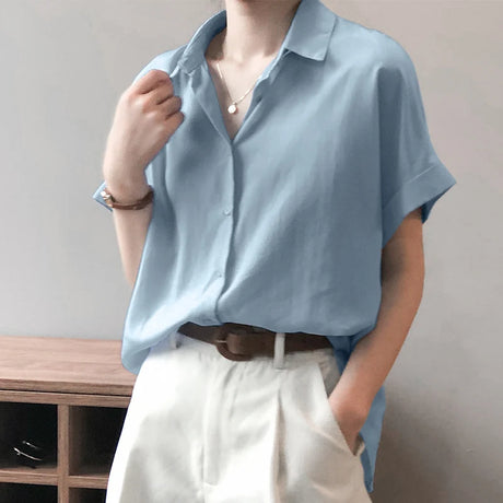 ZanzeaEase™ oversized summer blouse in light blue, featuring a button-down design and relaxed fit, perfect for women.