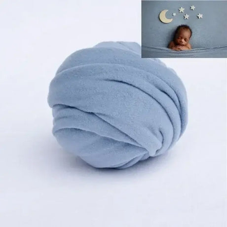 Soft blue polyester blanket for baby photo shoots, ideal for ages 0-1 year, unisex design, solid pattern backdrop.