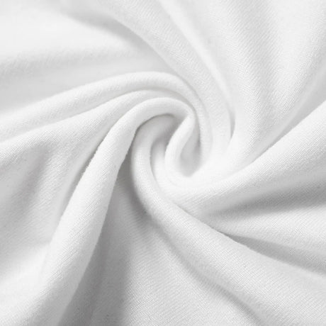 Close-up view of soft white knitted fabric ideal for summer tops and garments.
