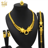 Luxury gold necklace set with earrings and bracelet, ideal for weddings and special occasions, showcasing intricate design.