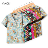 Colorful pediatric nursing scrub tops by VIAOLI featuring fun animal and floral patterns, perfect for healthcare professionals.