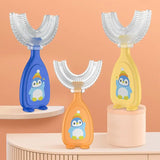 Colorful penguin-shaped children's toothbrushes displayed on a shelf, ideal for playful teeth cleaning.