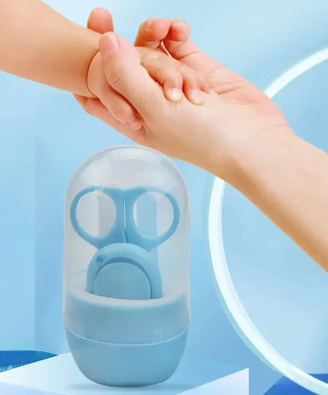 Newborn baby nail scissors in a protective case, designed for safe clipping with cartoon pattern, suitable for ages 0-6 years.