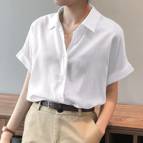 ZanzeaEase oversized summer blouse in white, featuring a button-down design and relaxed fit, perfect for warm weather.