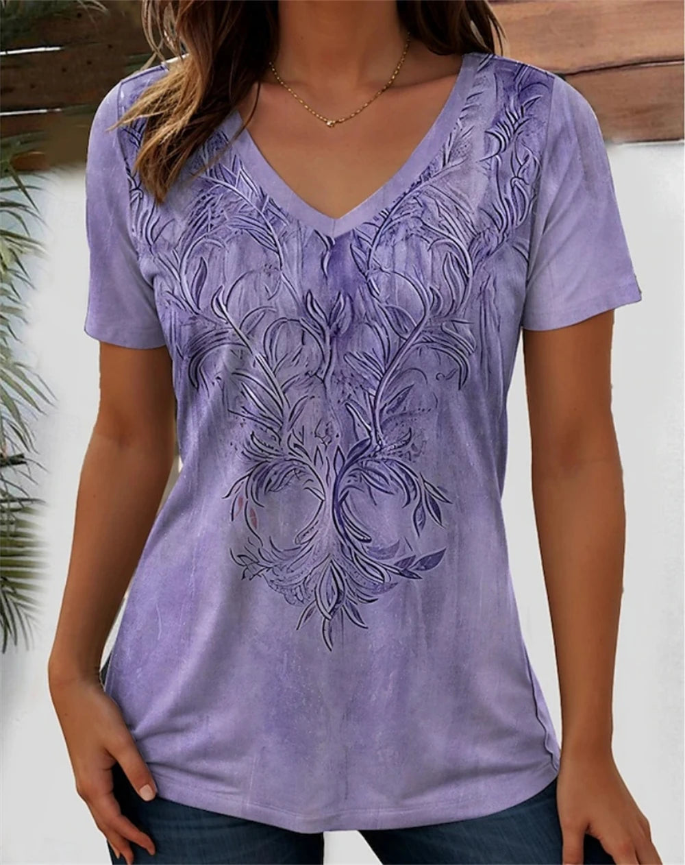 Purple 3D floral graphic V-neck tee for women, made from polyester with slight stretch, featuring a stylish design.