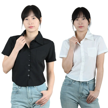 Model wearing a black and white short sleeve slim fit professional blouse, highlighting stylish business attire for women.