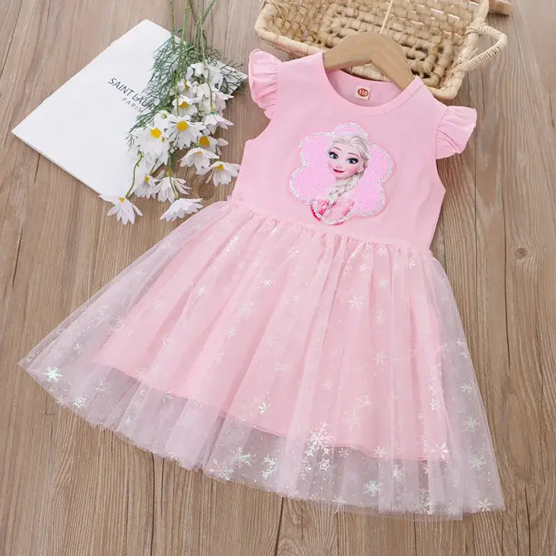 Girls summer dress featuring a pink bodice with puff sleeves and a sparkling mesh skirt, styled with a princess design.