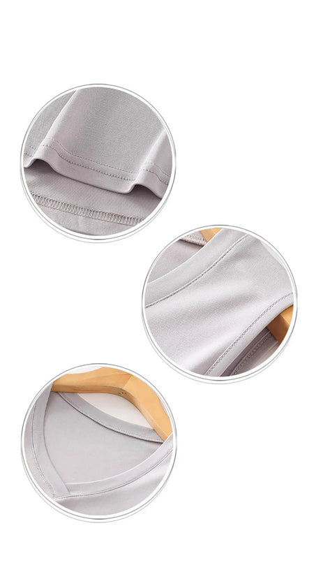 Close-up details of the Silkaire™ 100% Mulberry Silk Strap Top, showcasing V-neck design and high-quality fabric texture.