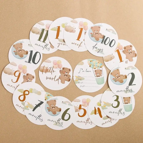 16Pcs paper baby milestone cards featuring cute bear patterns for tracking monthly growth and special moments.