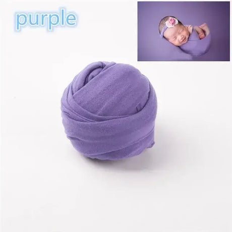 Solid purple baby blanket backdrop for photo shoots, soft polyester fabric ideal for newborns.