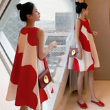 Loose sleeveless Korean maternity dress in red and white, knee-length, perfect for summer and formal occasions.