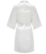 Elegant satin robe for brides featuring 'Bride' embroidery, perfect for wedding day preparation.