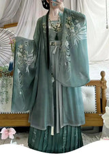 Song Dynasty Hanfu set in soft green chiffon featuring intricate floral printing and elegant layered silhouette.