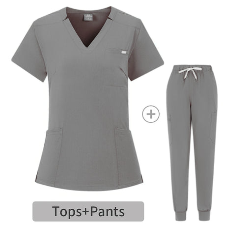 Gray scrub set featuring a V-neck top with pockets and matching pants, ideal for healthcare professionals.