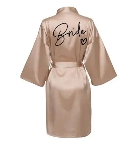 Back view of a satin robe with 'Bride' written in elegant script, perfect for bridal parties.