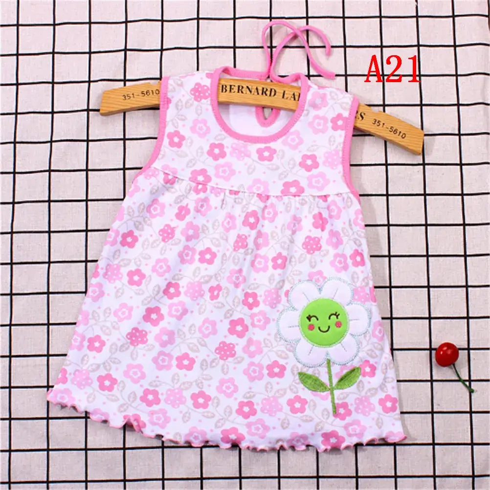 Floral cotton sleeveless dress for newborn girls, pink with flower pattern, ideal for summer wear.