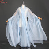 Women’s Classical Hanfu stage costume in light blue, showcasing flowing sleeves and elegant design.