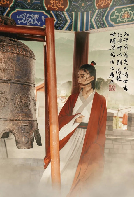 Swordsman Hanfu Costume inspired by Tang Dynasty, featuring a wine-red robe and traditional design in scenic setting.