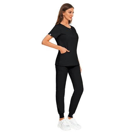 Woman in black 7-color nursing uniform featuring a zipper V-neck top and pants, ideal for various work settings.