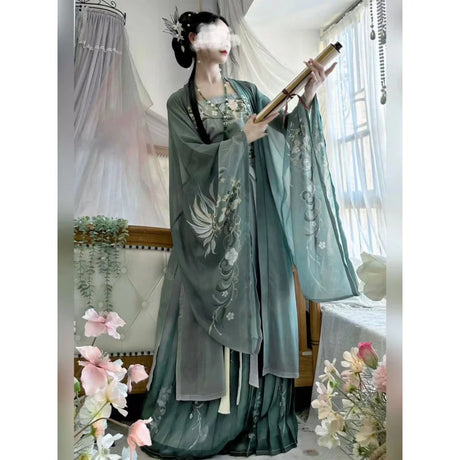 Elegant woman in Song Dynasty hanfu set, showcasing intricate floral prints and stylish chiffon fabric.