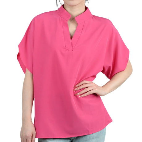 FlareFemme™ V-Neck summer blouse in vibrant pink, featuring short flare sleeves and an elegant loose fit for women.