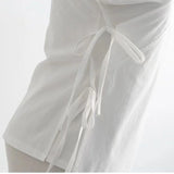 Close-up of a white traditional Hanfu inner robe showing tie details, made from polyester for men and women.