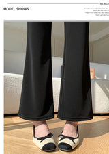 Y2K bootcut maternity pants in black displayed with stylish flats, showcasing comfort and fashion for summer wear.