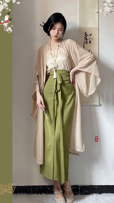 Woman in a three-piece Princess Song Dynasty Hanfu robe featuring beige and green colors, showcasing a traditional Asian outfit.