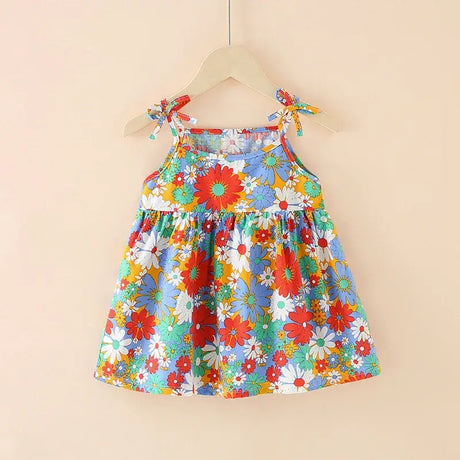 Colorful summer dress for young girls featuring floral print and adjustable straps, perfect for kids ages 4-6.