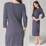 Postpartum nursing maternity dress in striped design with 3/4 sleeves, knee-length, suitable for breastfeeding.