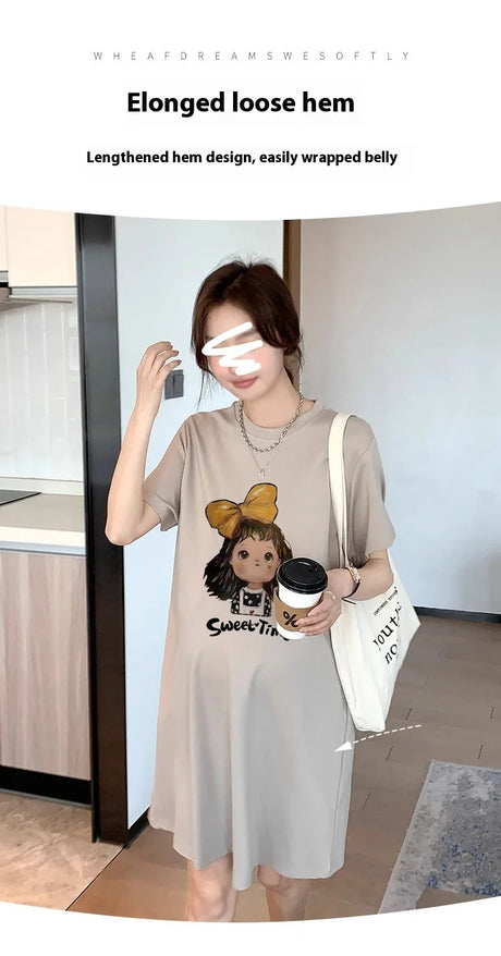 Loose maternity T-shirt dress with cartoon print, perfect for summer, featuring an elongated hem design.