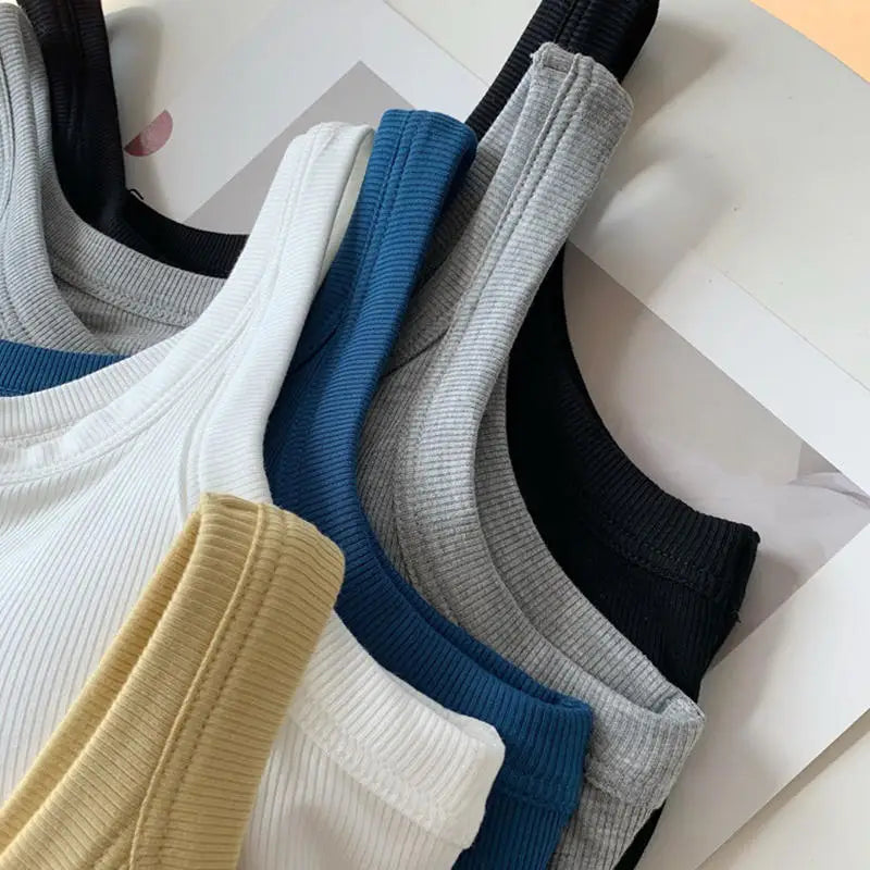 SlimCotz™ padded cotton spaghetti camis in various colors, perfect for summer and breathable wear.