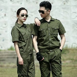 Two models wearing a summer green cotton work suit designed for welding protection, showcasing functionality and style.